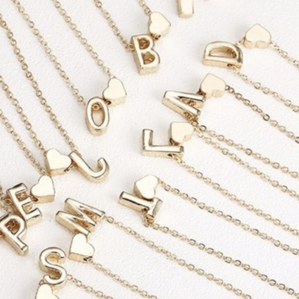 Stainless Steele gold color W/initial and heart 💖